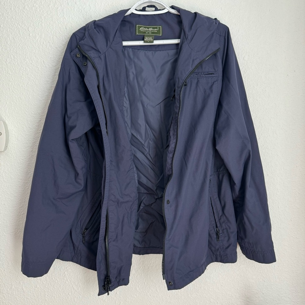 Eddie Bauer dark navy blue zip up rain jacket with hood women’s size L